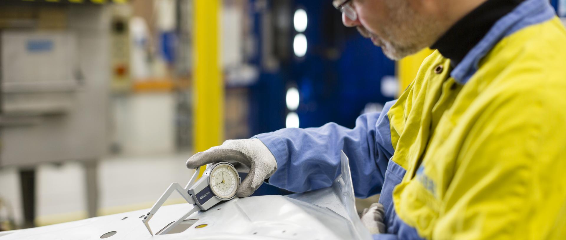 Technician quality testing a panel
