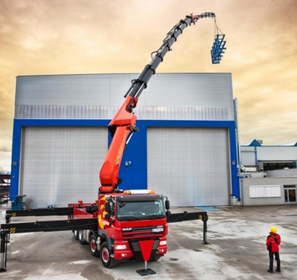 Loader crane moving material