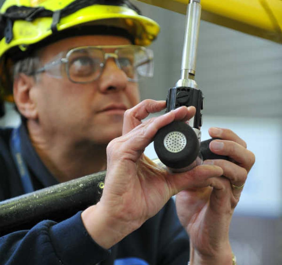 Tata Steel operative working on steel component Tata Steel operative working on steel component