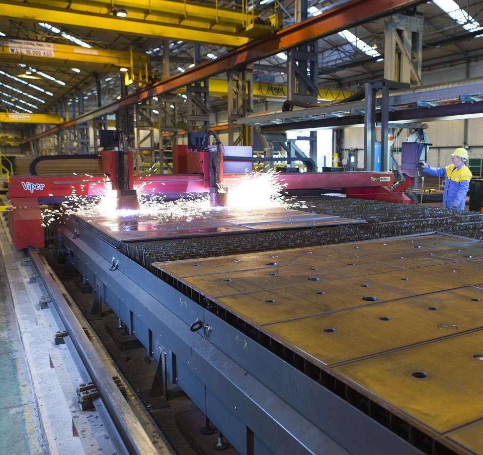 Metal worker using Ympress Laser 