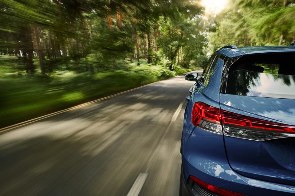 Automotive moving blue car