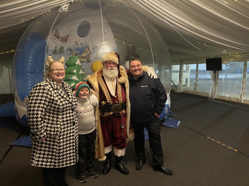 Santa smiles with Llanwern Works Manager Craig Phillips and his family Santa smiles with Llanwern Works Manager Craig Phillips and his family