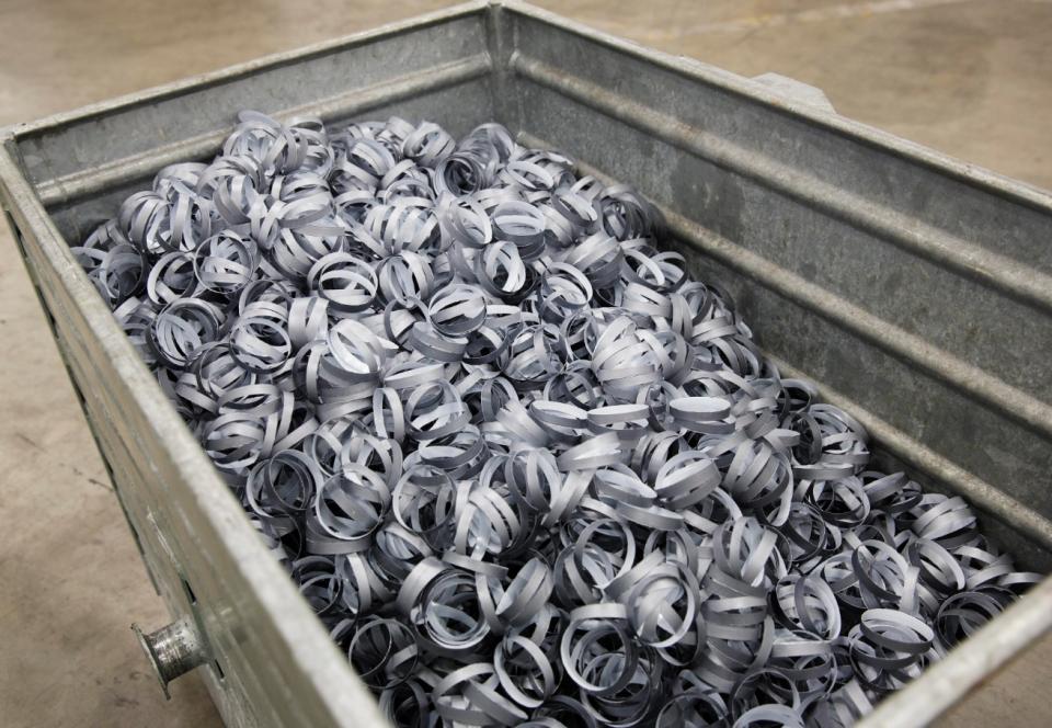 Packaging scrap in a container to be recycled into new packaging steel