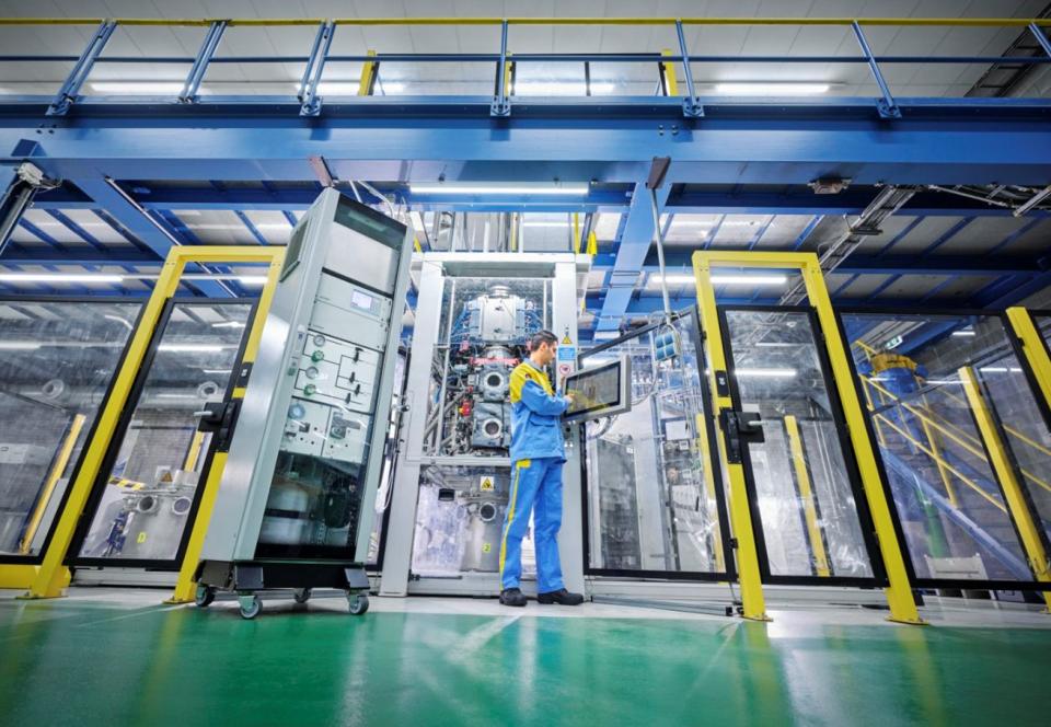 Tata Steel Nederland employee checking data on screen at production facility